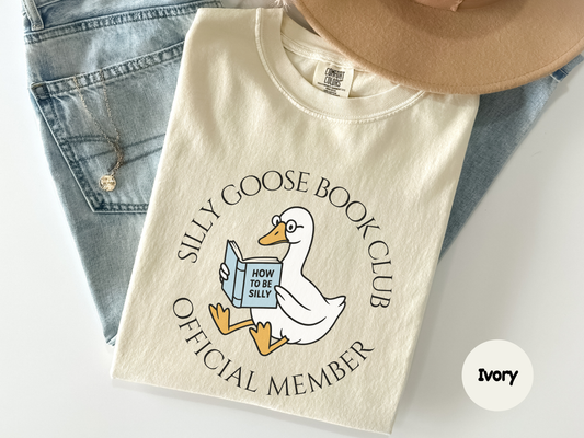 Book lover graphic tee with adorable goose reading how to be silly ideal gift for librarians readers and book club members
