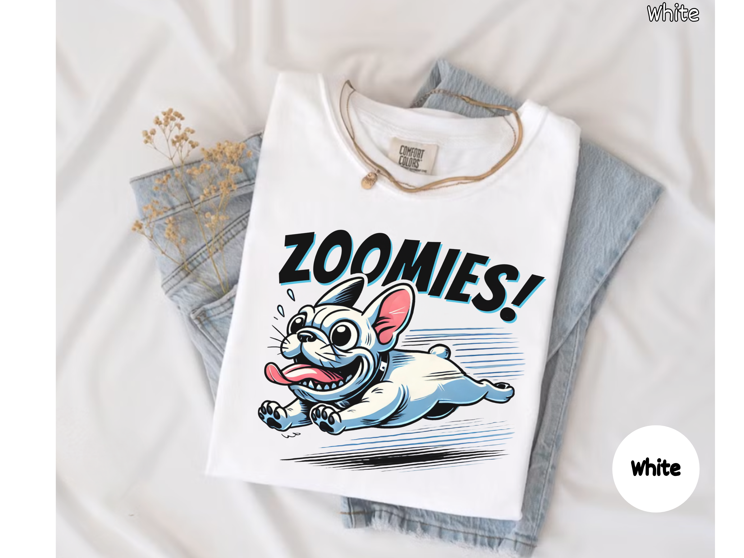 Adorable running French Bulldog t shirt with Zoomies text showing excitement and energy ideal for funny dog shirts and pet-themed apparel.