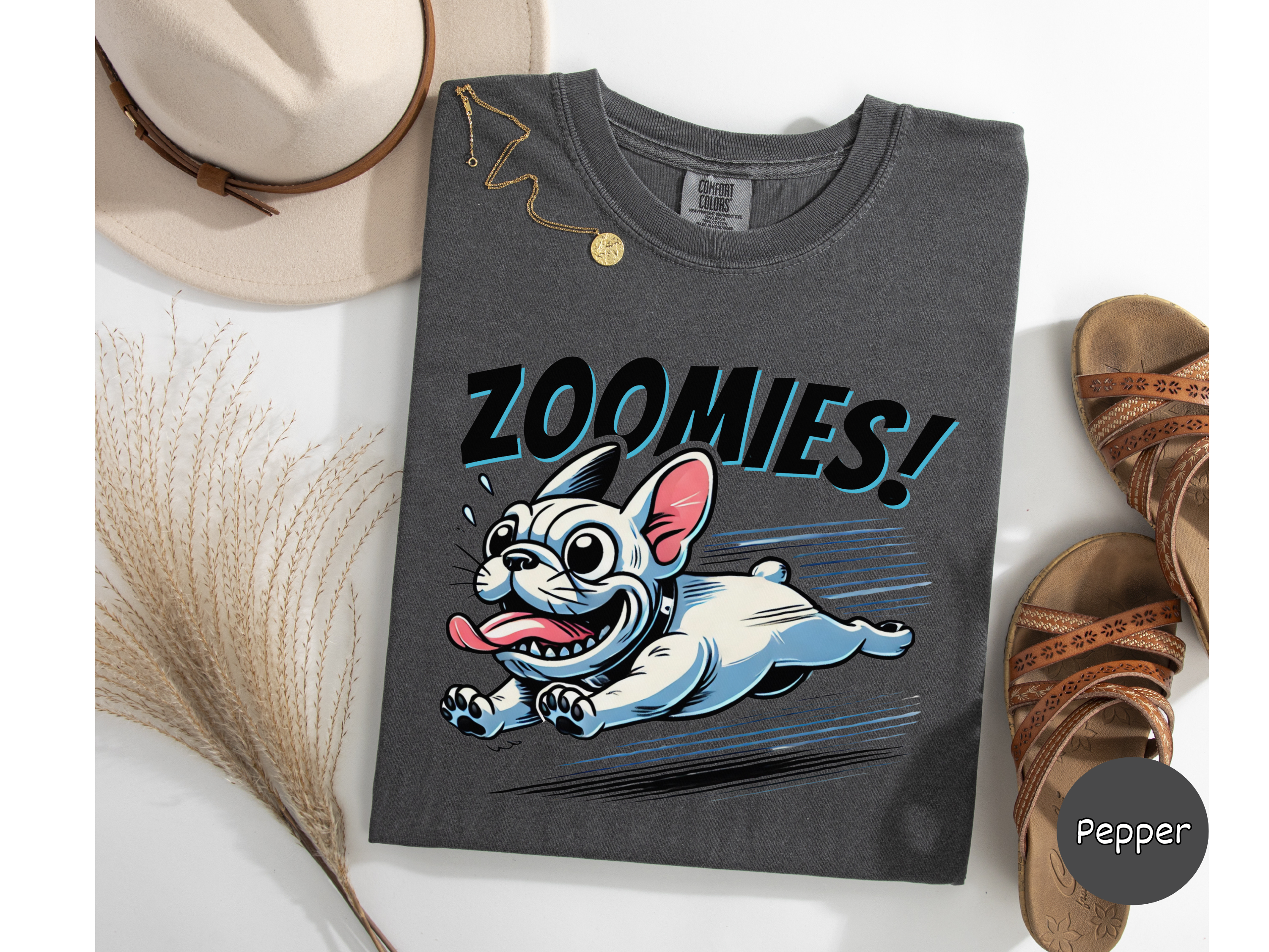Happy bulldog cartoon shirt sprinting fast with tongue flopping and Zoomies lettering for dog enthusiasts and humor-loving animal fans.