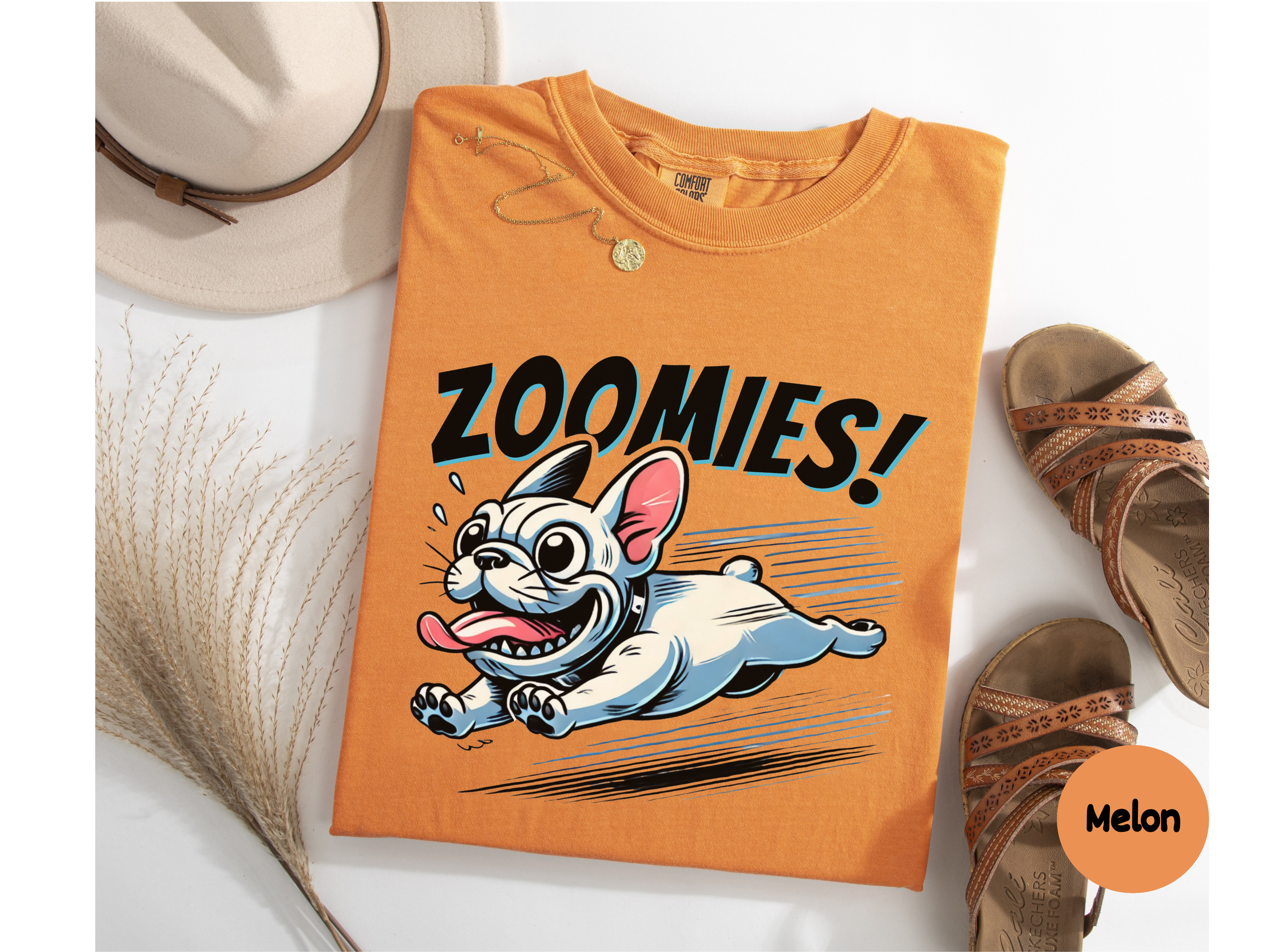 Cartoon French Bulldog T-Shirt sprinting with tongue out and big smile under the word Zoomies perfect for dog lovers and pet parents who adore energetic puppy art.