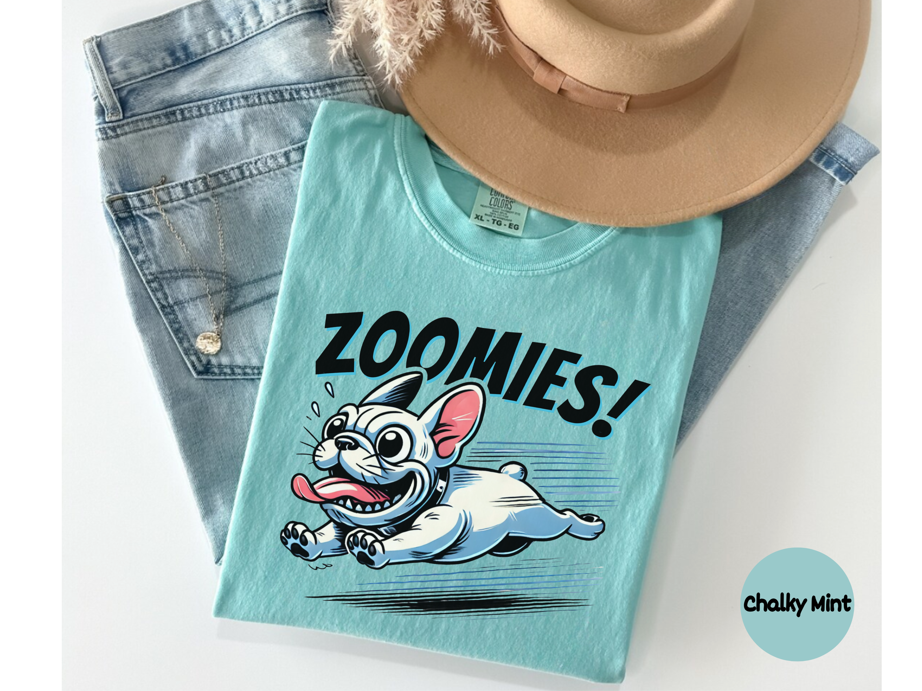 Energetic bulldog t shirt with the word Zoomies showing funny playful energy great for dog parents and animal humor apparel.