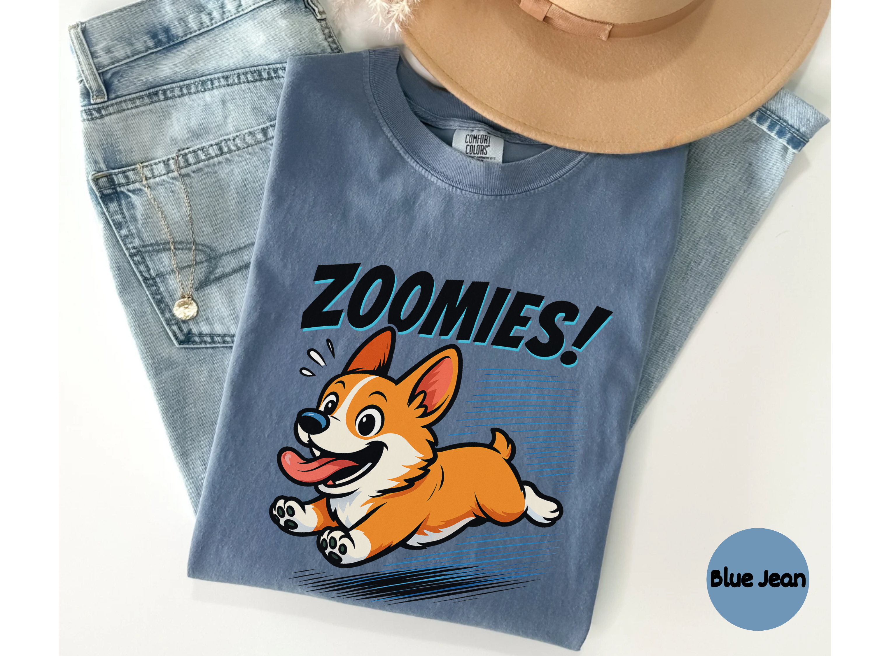 Dog lover tee featuring corgi zoomies scene on comfortable unisex shirt perfect for pet parent casual wear.