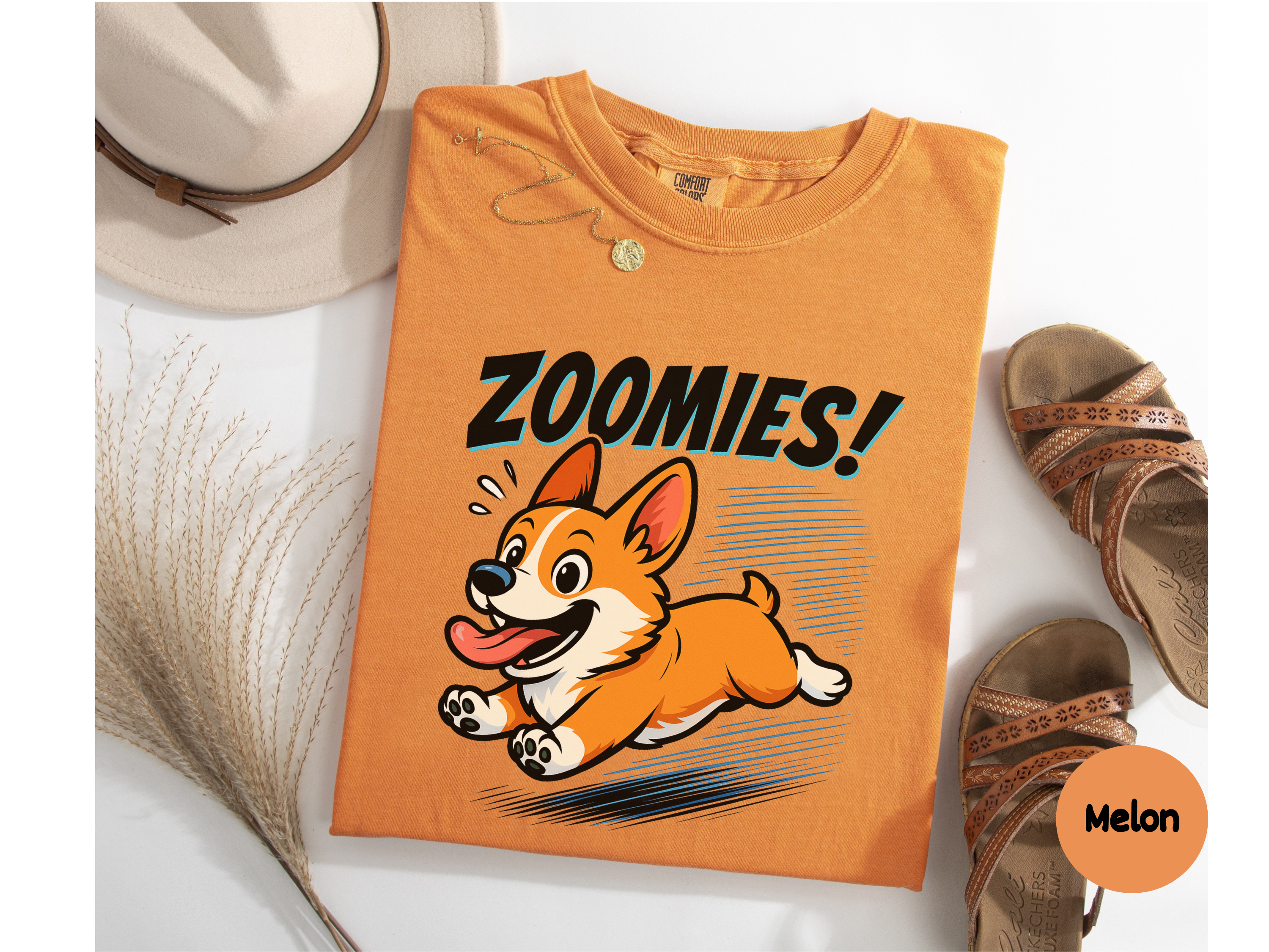 Funny corgi tee showing a playful dog mid-zoomies in vibrant print ideal for corgi moms dads and casual wear.