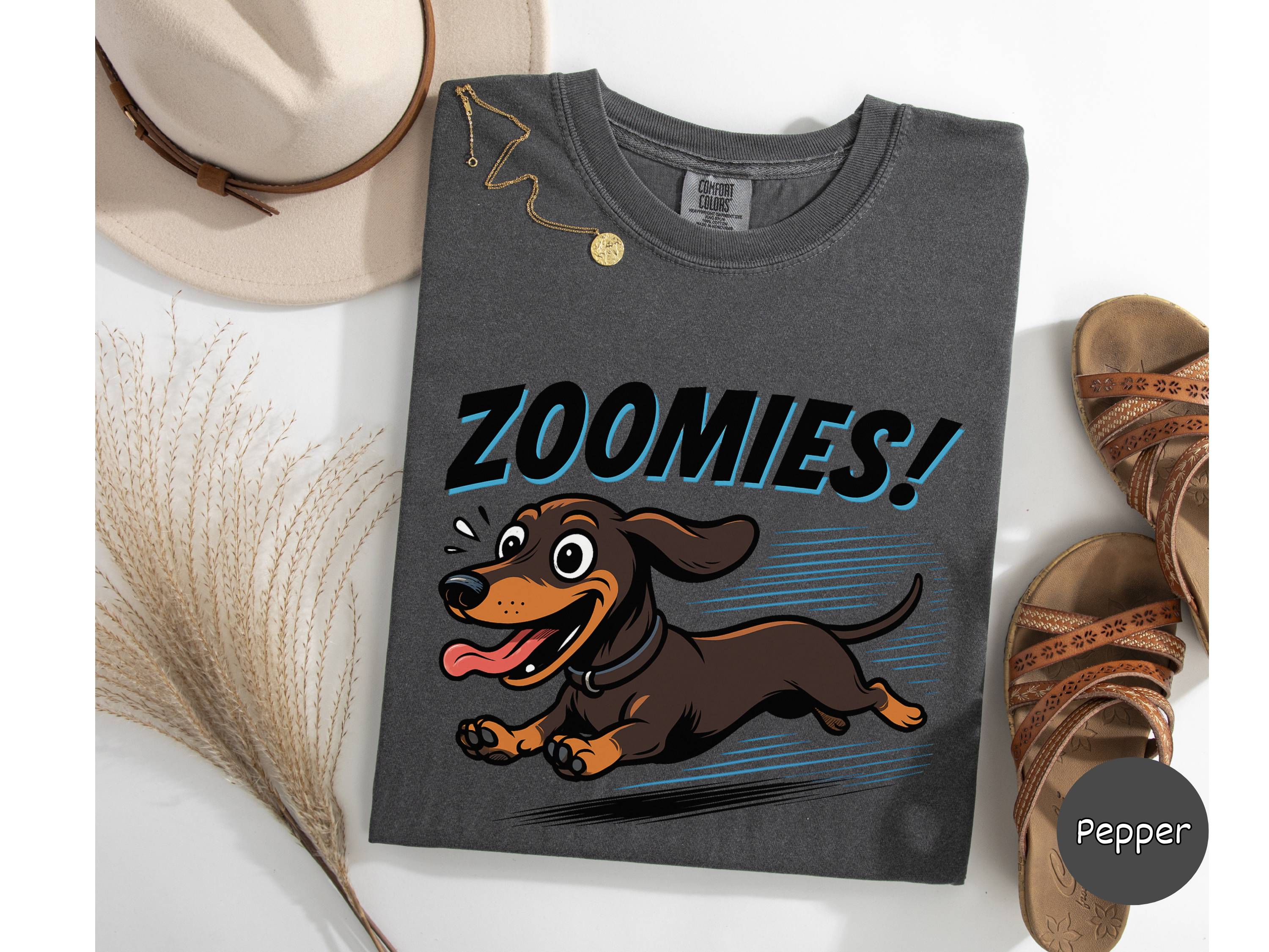 Cute dachshund t-shirt capturing long-bodied short-legged sausage dog in zoomies style perfect for wiener dog fans and casual wear.