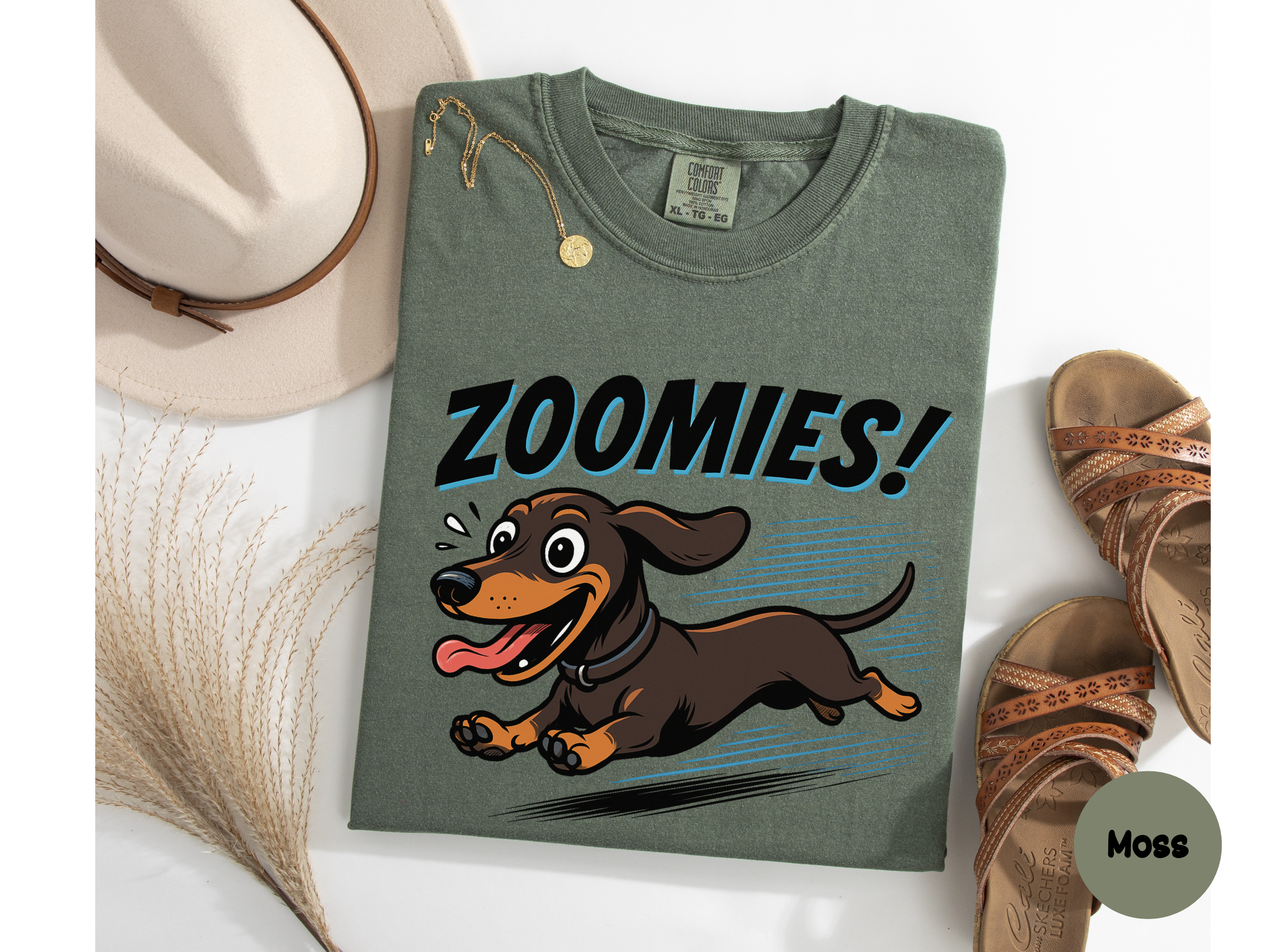 Soft unisex dachshund shirt with joyous sausage dog zoomies illustration ideal for dog owner wardrobe or gift to pet lovers.
