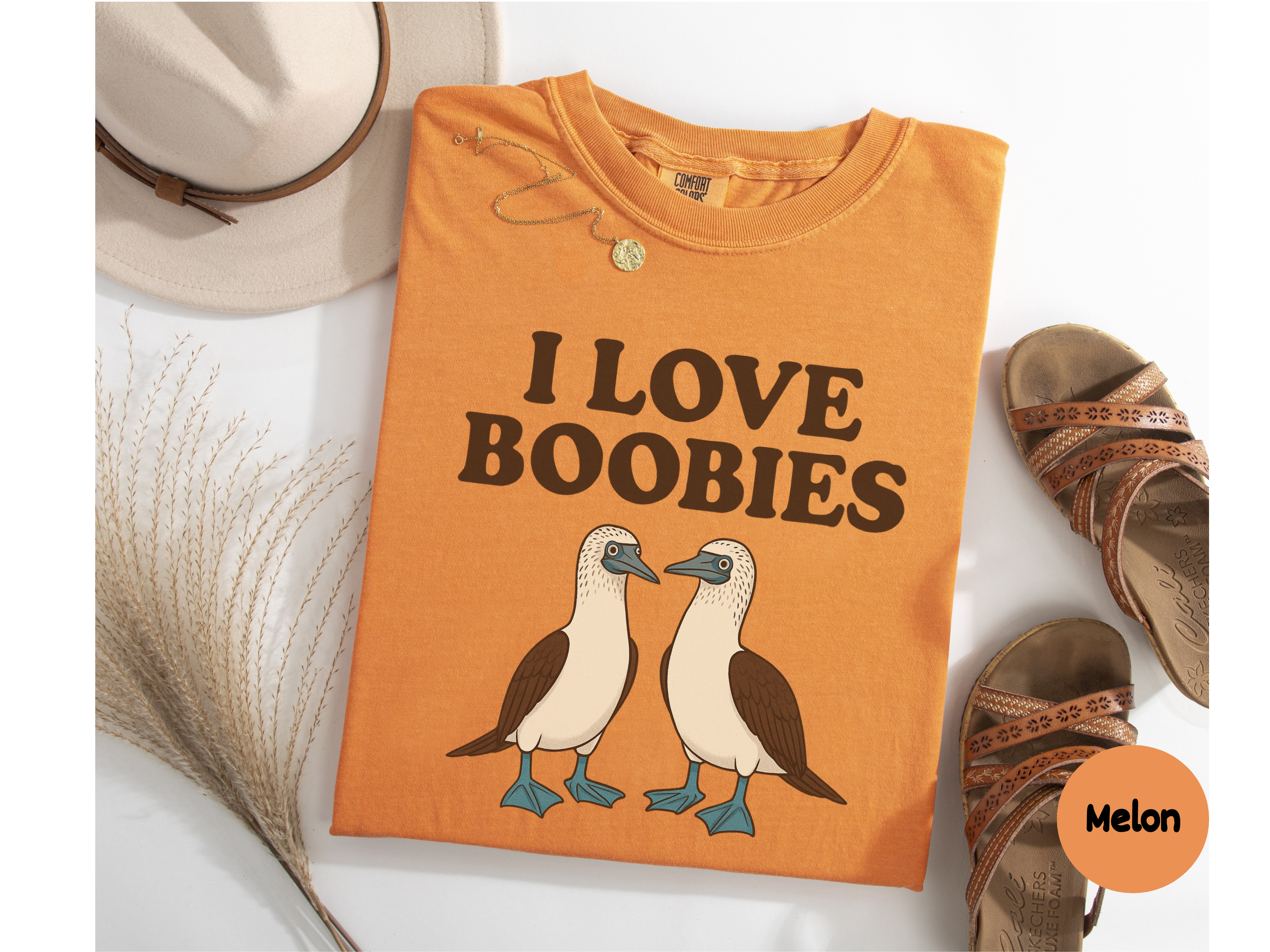 Funny “Boobies” shirt with bird pun graphic on soft tee ideal for gag gift lovers and humor apparel fans.