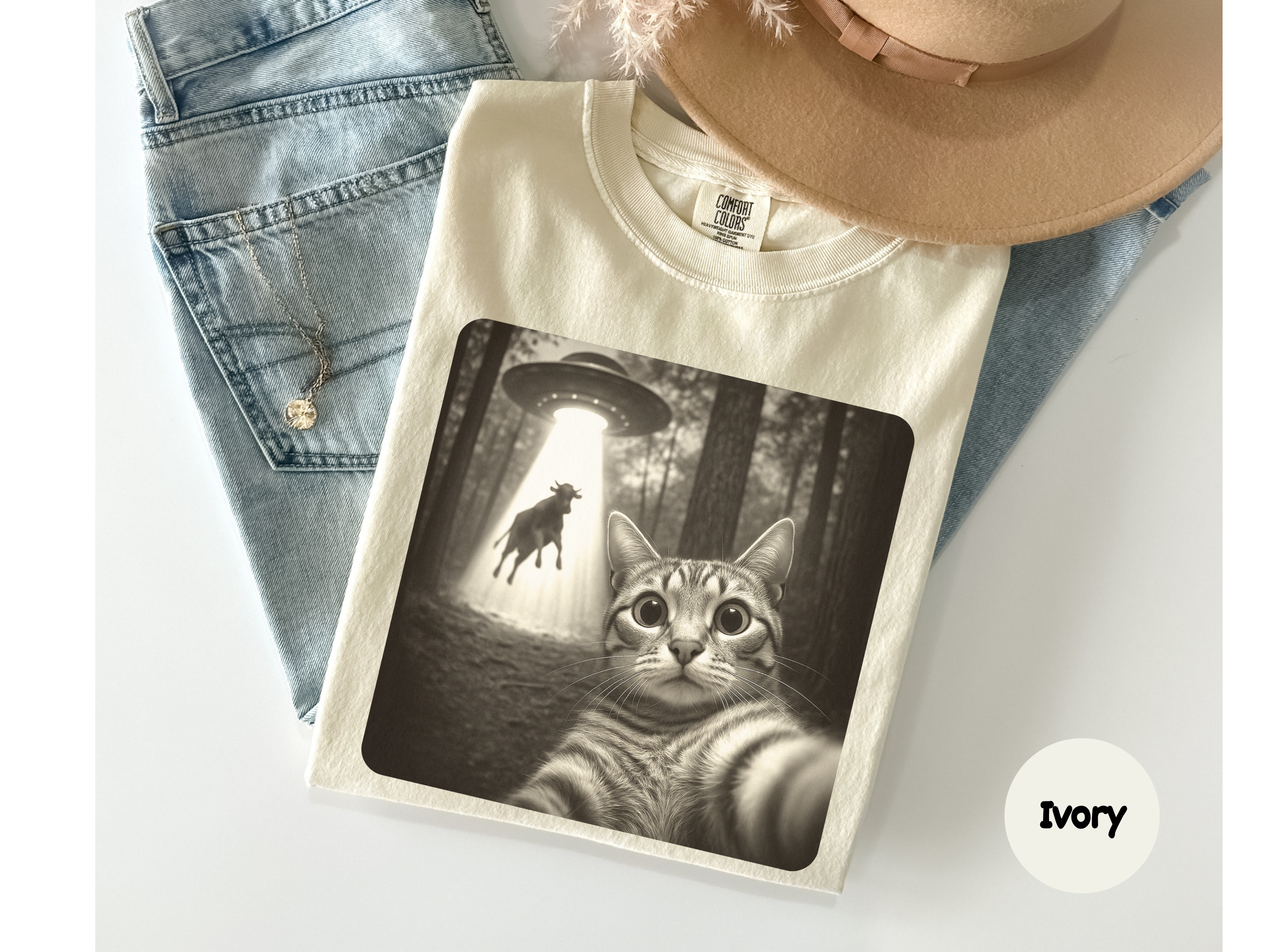 Cat lover shirt with alien abduction scene and selfie moment on comfy tee great for sci-fi fans and casual wear.