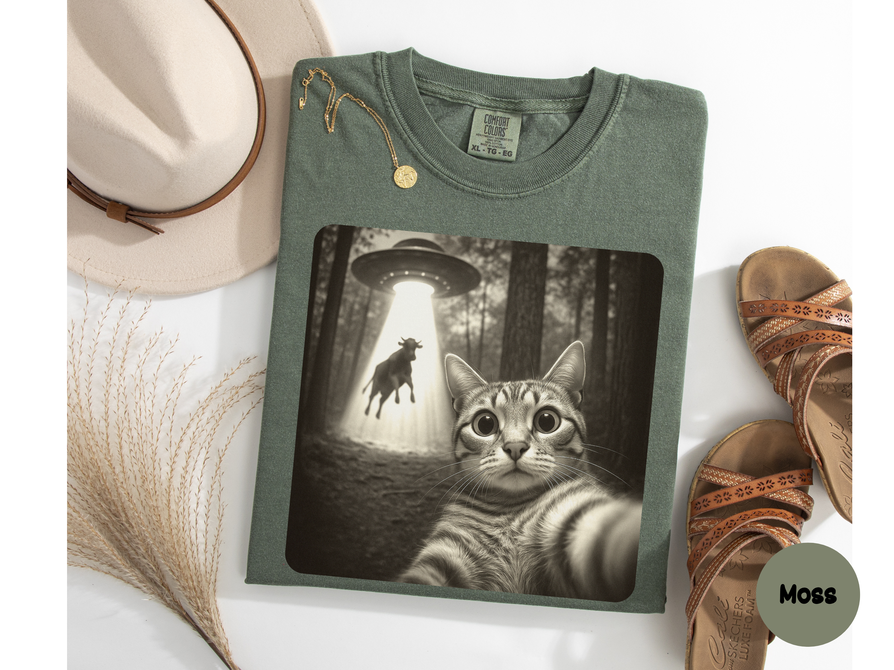 UFO cat tee with funny graphic showing cat abducted while taking selfie perfect for cat owners and quirky apparel.