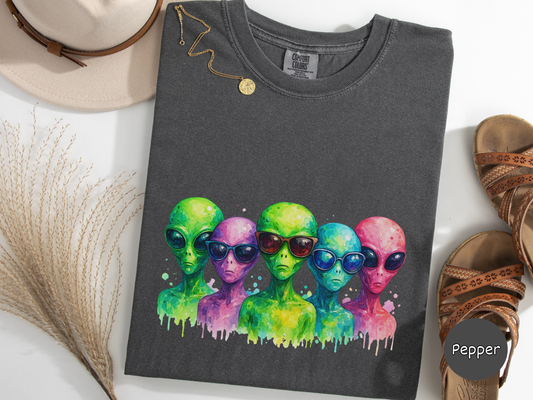 Colorful alien artwork t shirt showing a stylish squad of extraterrestrials with sunglasses perfect for sci fi fans and quirky art lovers