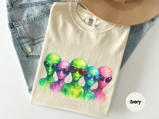 Cool alien graphic tee with bright watercolor style aliens in sunglasses designed for people who love bold space art and funny novelty shirts