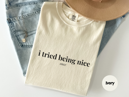 Funny sarcastic graphic tee featuring the phrase “i tried being nice… once” centered on a black background for dry humor and blunt personality style