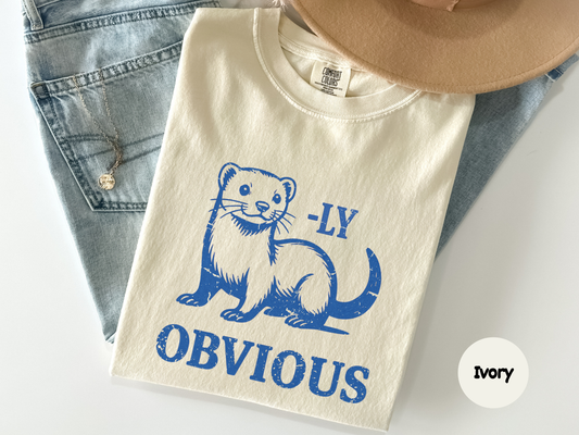 Cute ferret graphic tee showing a playful ferret design with bold text reading “Ferretly Obvious” for small animal fans