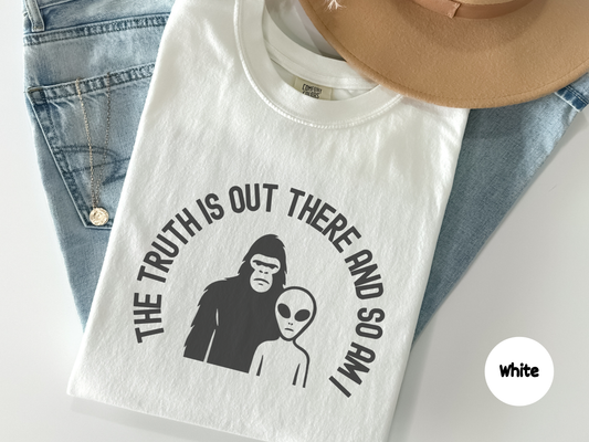 Minimalist conspiracy t shirt featuring a simple alien and Bigfoot silhouette with the words The Truth Is Out There And So Am I perfect for paranormal fans who prefer clean modern design