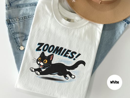 Funny tuxedo cat t shirt featuring a high energy black and white cat running with zoomies designed for cat owners pet lovers and fans of playful feline humor