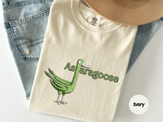 asparagoose shirt graphic featuring cartoon goose made of green asparagus spears with silly expression on black background